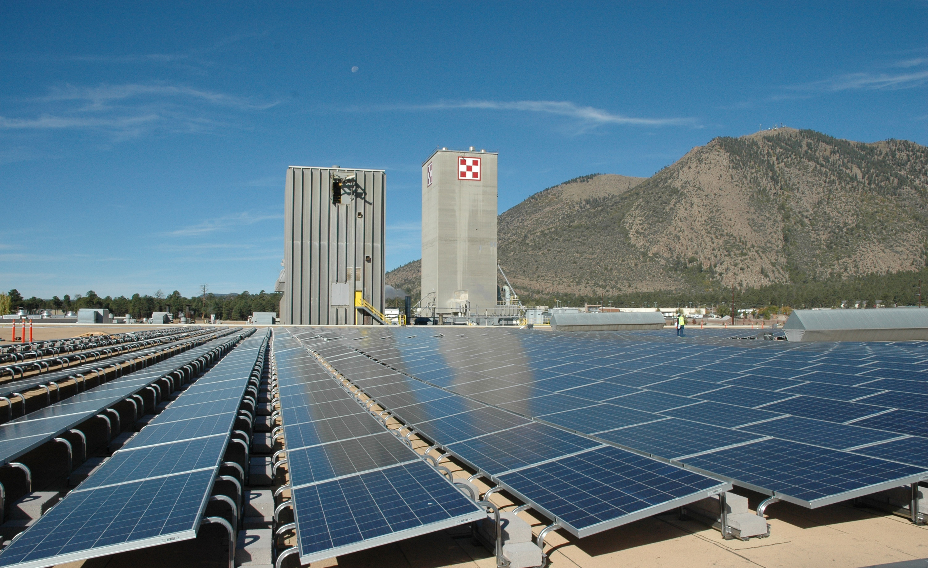 Utility-scale solar farm array under afternoon sun in Arizona (file photo).
